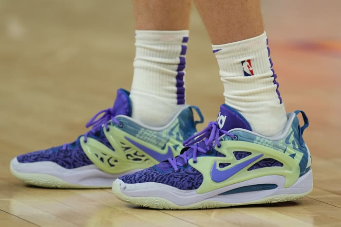 VIew of blue and green Nike KD shoes.